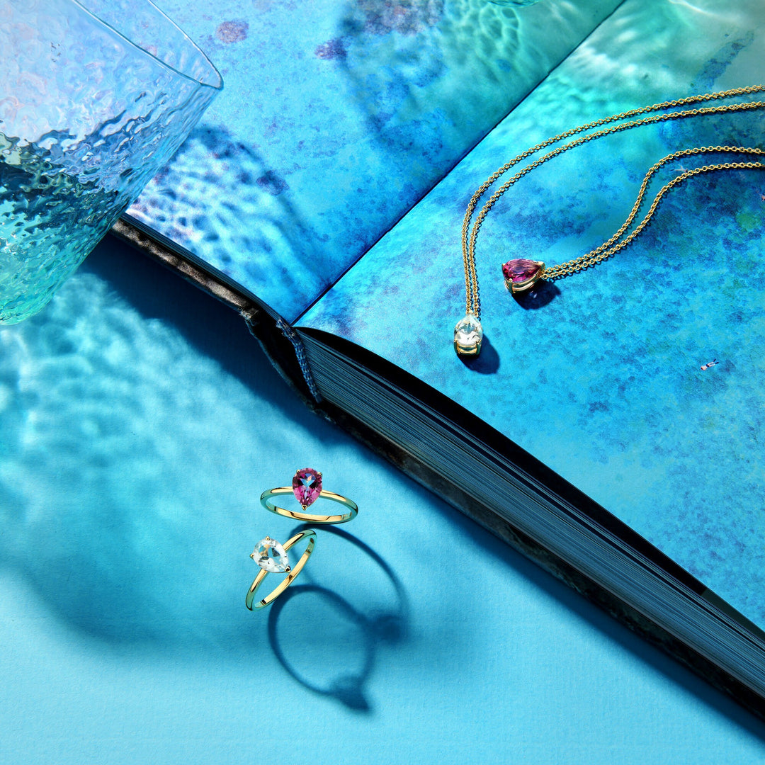 14k Geelgouden collier met blauwe topaas