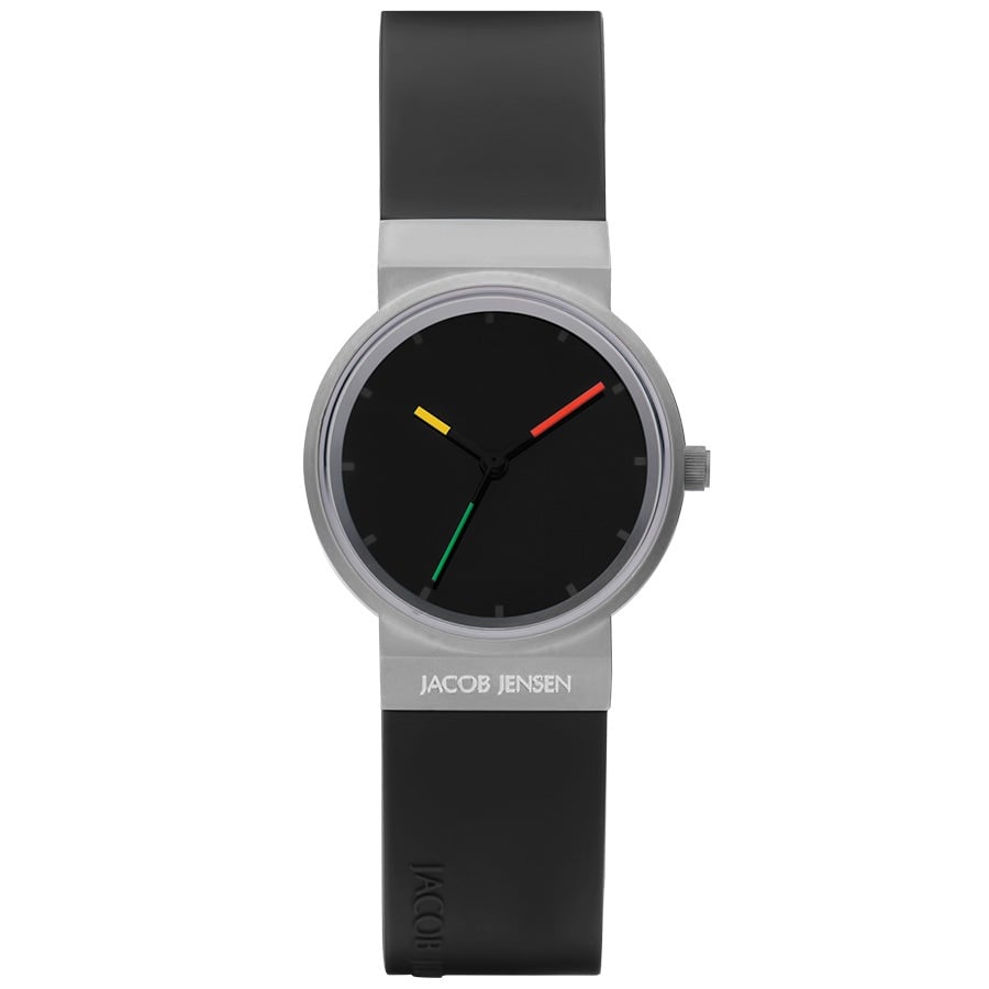 Zilveren horloge met zwarte wijzerplaat en rubberen zwarte band, voorzien van kleurrijke wijzers in rood, geel en groen.
