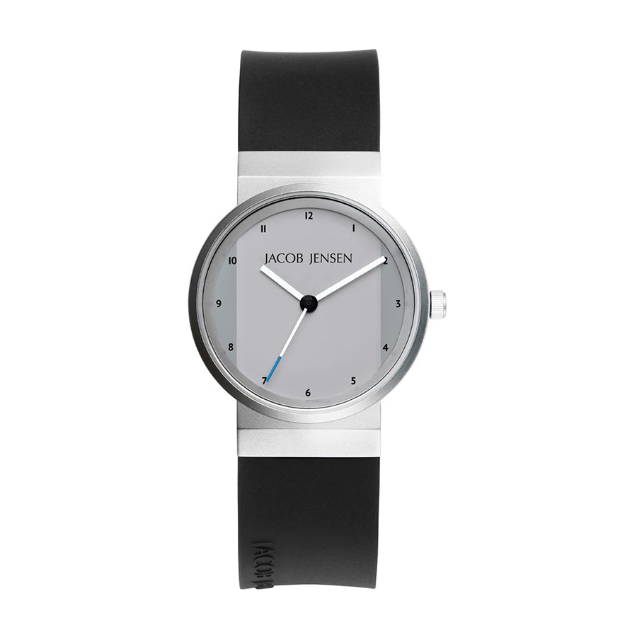 Zilveren horloge met grijze wijzerplaat, zwarte rubberen band en blauwe secondewijzer.