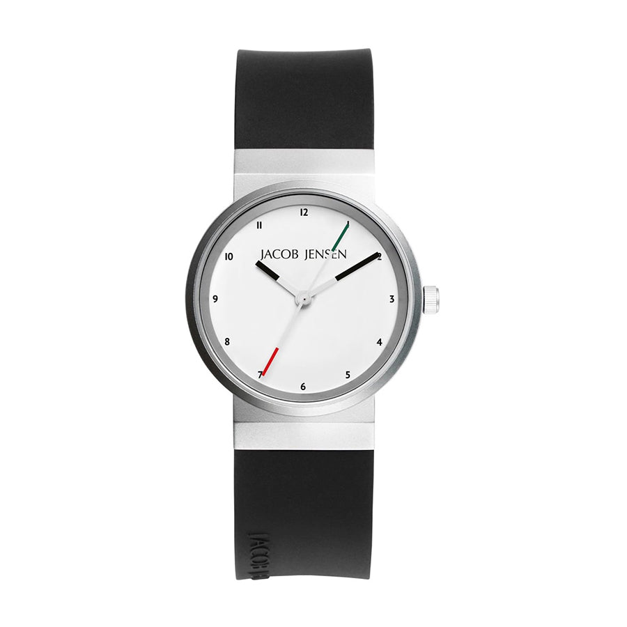 Zilveren horloge met witte wijzerplaat, zwarte rubberen band en opvallende rode en groene wijzers.