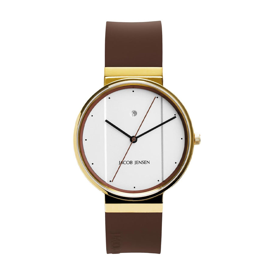 Gouden horloge met witte wijzerplaat, bruine rubberen band en zwarte indexen.