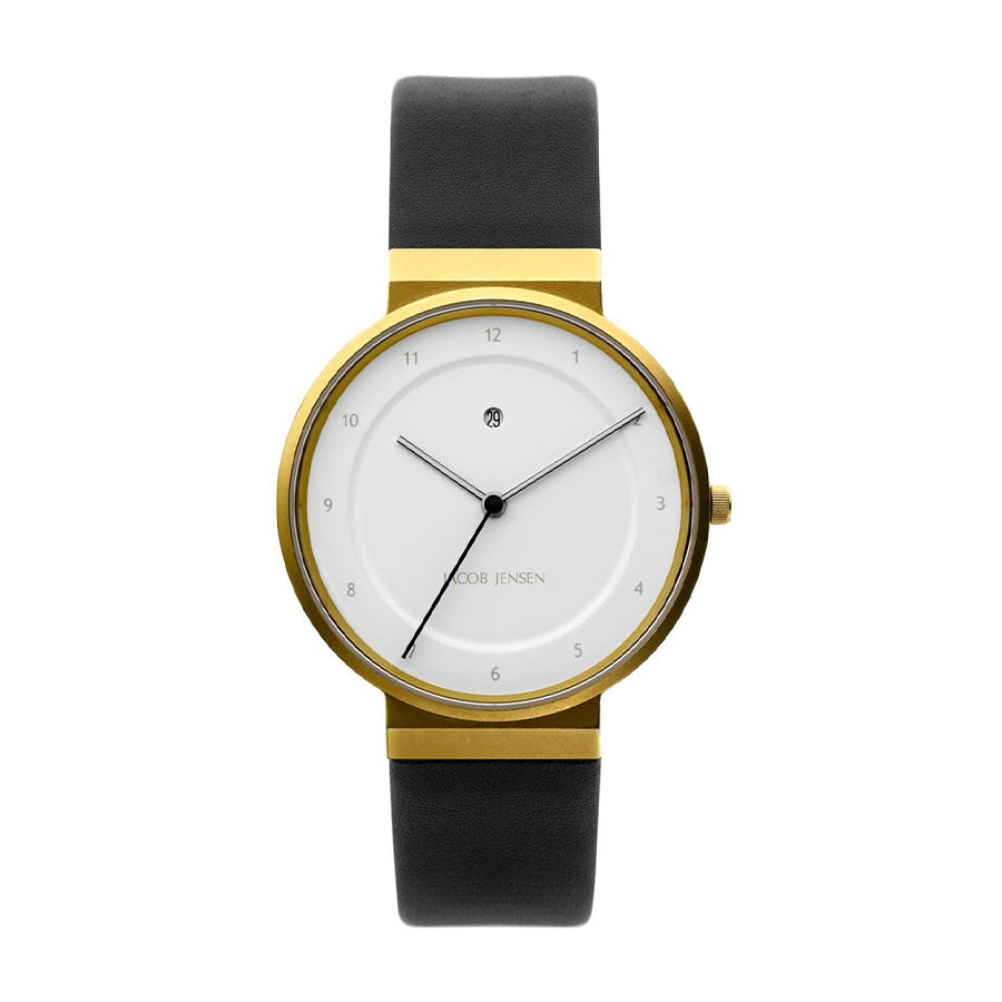 Gouden horloge met witte wijzerplaat en zwarte rubberen band.
