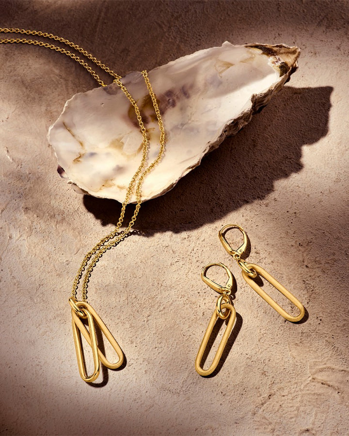 Opvallende Geelgouden Oorhangers met Gematteerd Gouden Elementen – 14-Karaat Luxe voor Dames