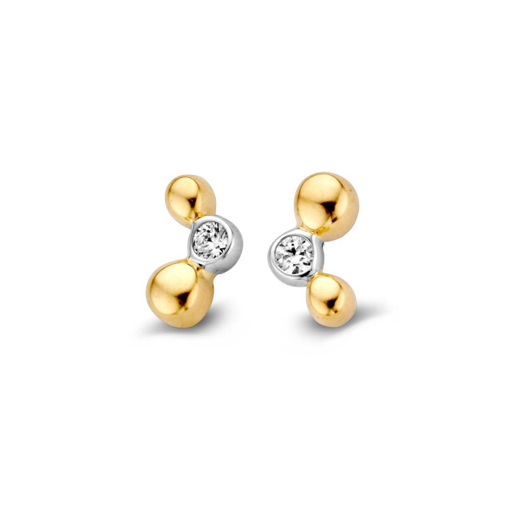 Bicolor geel/wit gouden oorstekers met een witte zirkonia van 4,5 mm en een speelse bolvorm.