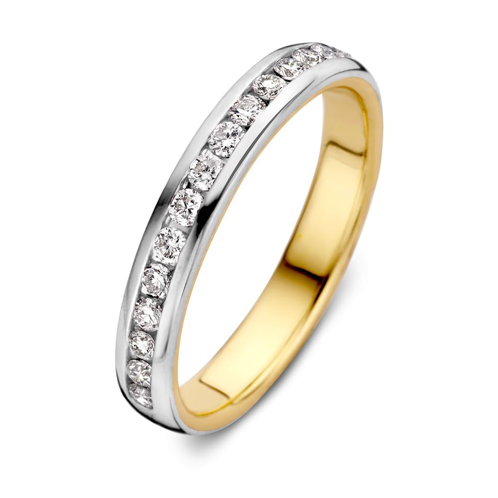 Bicolor ring van wit- en geelgoud met een rij van briljant diamanten, totaal 0.32 crt.