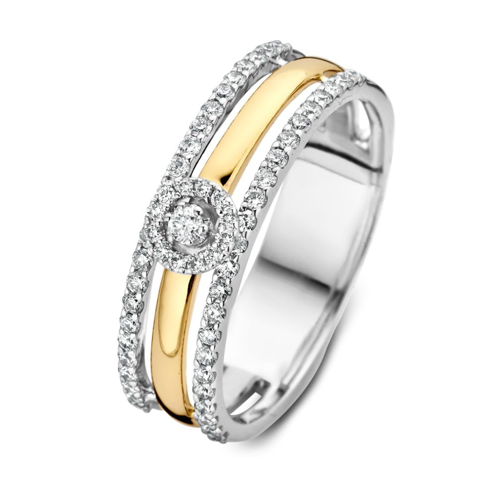 Brede damesring in wit en geel goud met solitaire effect en twee aanschuifringen, bezet met 0.37 crt diamanten.