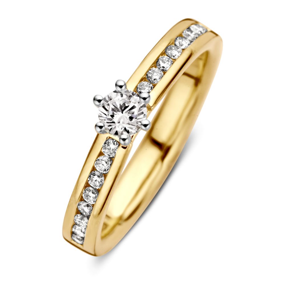 Bicolor damesring van geel- en witgoud met een centrale diamant en een rij kleine diamanten aan de zijkanten.