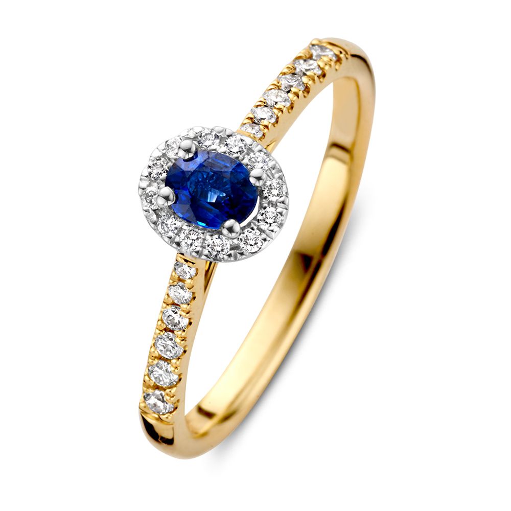 Bicolor gouden damesring met een blauwe ovale saffier omringd door een halo van diamanten.