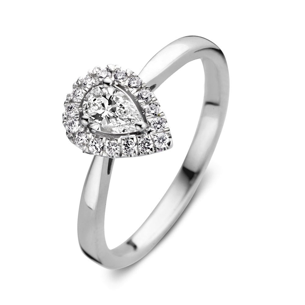 Witgouden ring met een hartvormige zirkonia-setting en een centrale diamant van 0,30 crt.