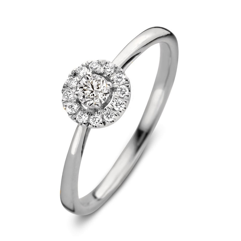 Witgouden ring met een ronde, verzilverde zetting en een centrale diamant omringd door kleinere diamanten.