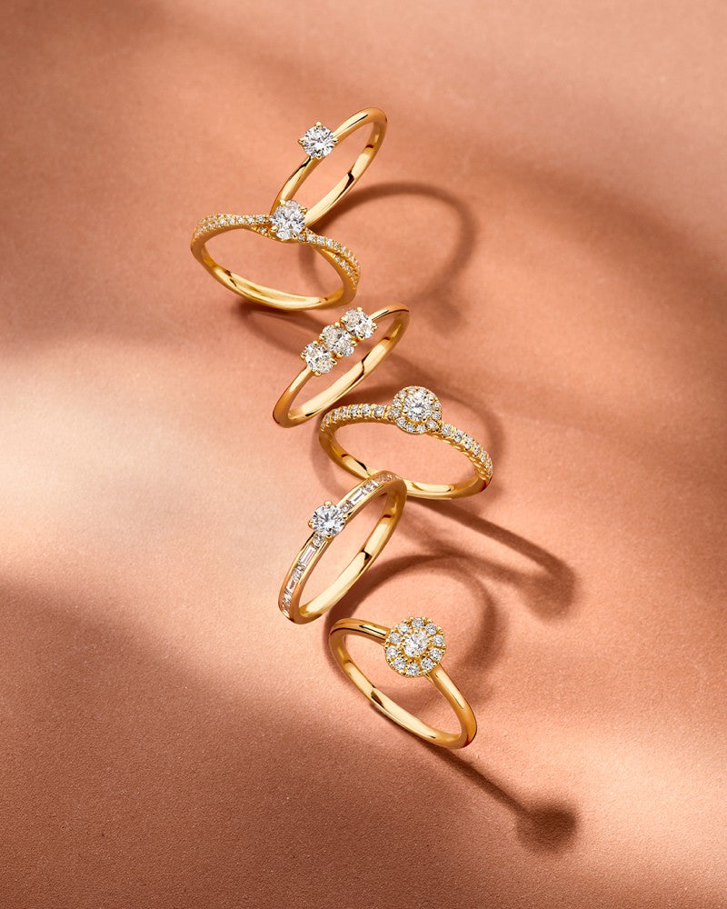 Stijlvolle Geelgouden Diamanten Solitair Ring met Baguette en Briljant Slijpsels – 14 Karaat 0.63 crt.