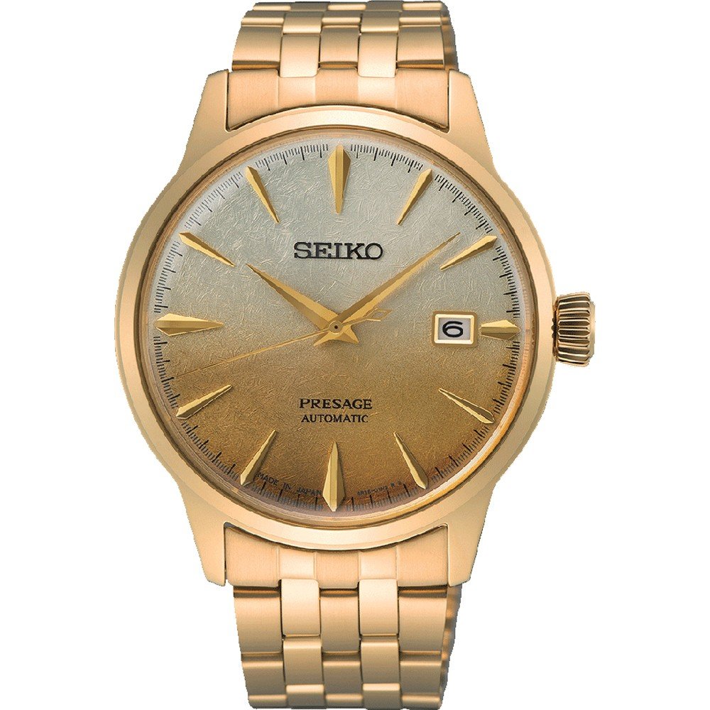 Gouden Seiko Presage heren horloge met een gradient wijzerplaat en datumaanduiding, voorzien van een schakelarmband.