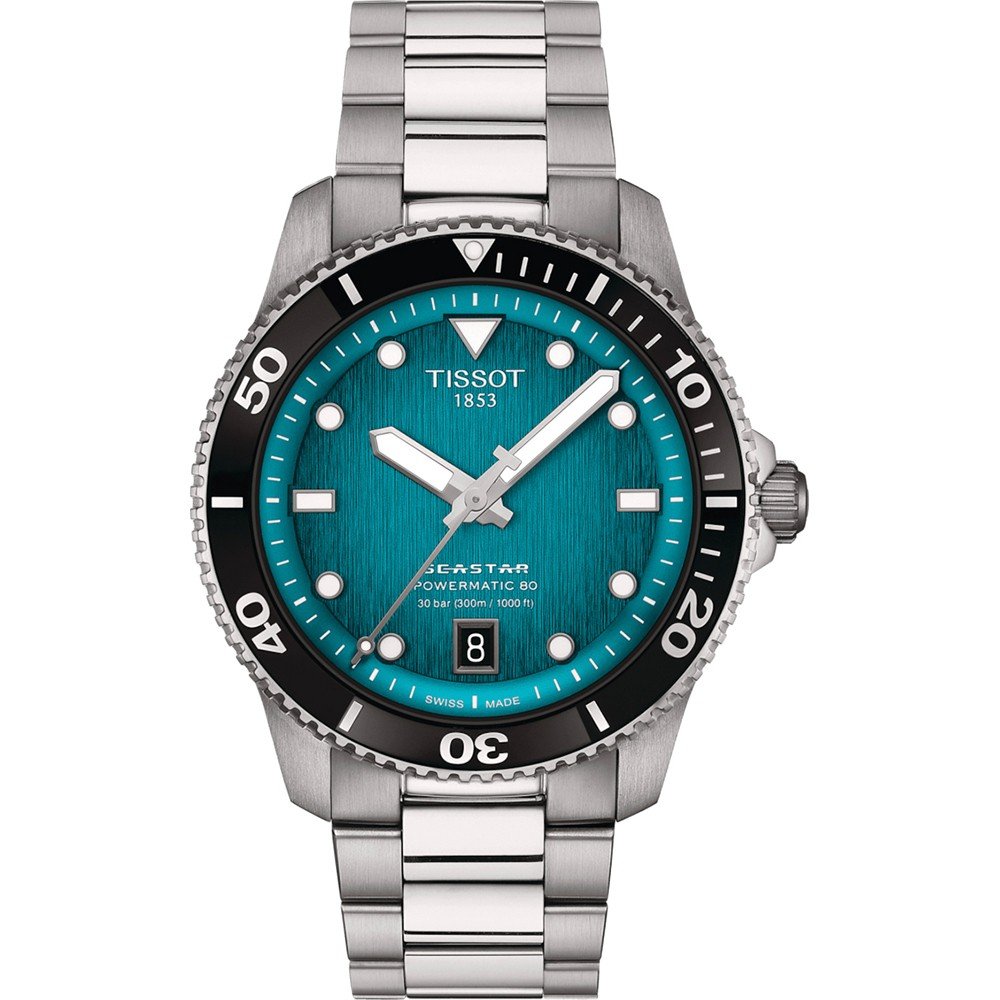 Zilveren duikhorloge met turquoise wijzerplaat, zwarte bezel en datumaanduiding op 6 uur.