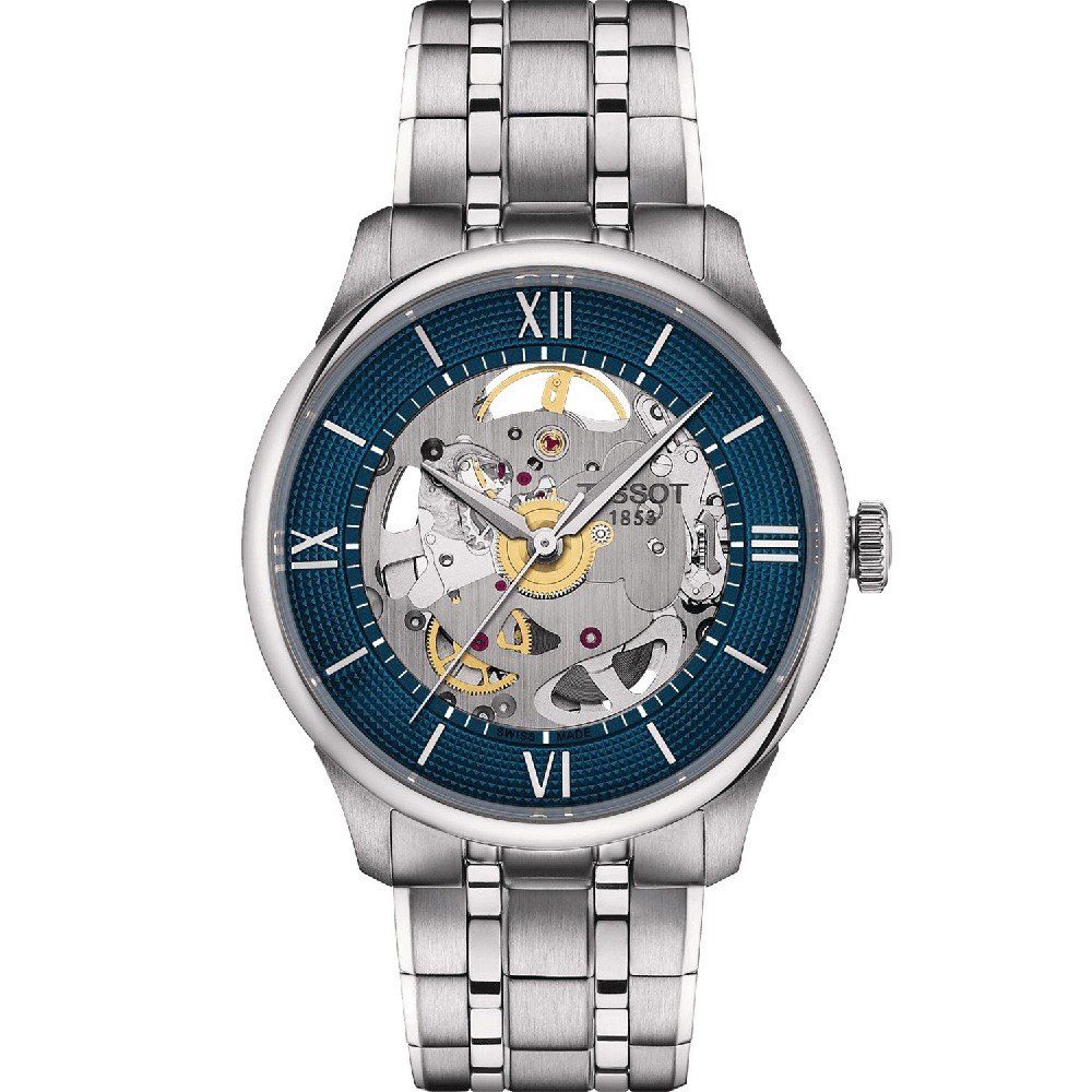 Zilveren horloge met blauwe wijzerplaat en opengewerkt mechanisme, Romeinse cijfers en metalen schakelband.