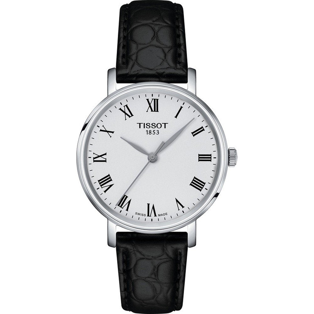 Zilveren horloge met witte wijzerplaat, zwarte leren band en Romeinse cijfers.