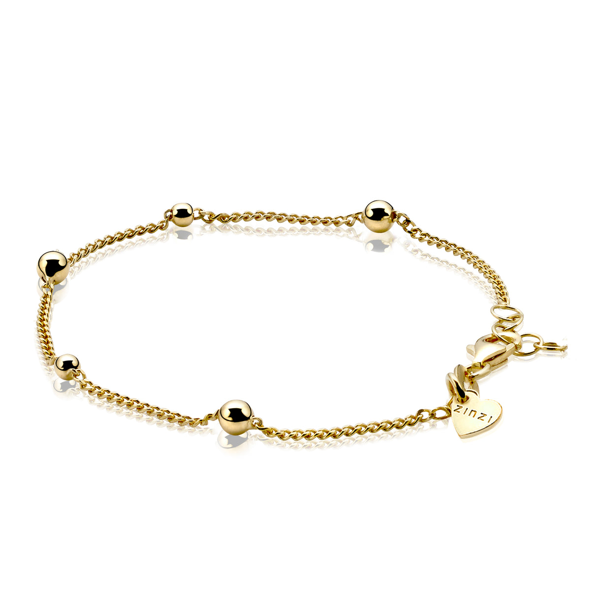 Gouden armband met bolletjes en een fijne schakelketting, voorzien van een sluiting en een hartvormig hangertje.