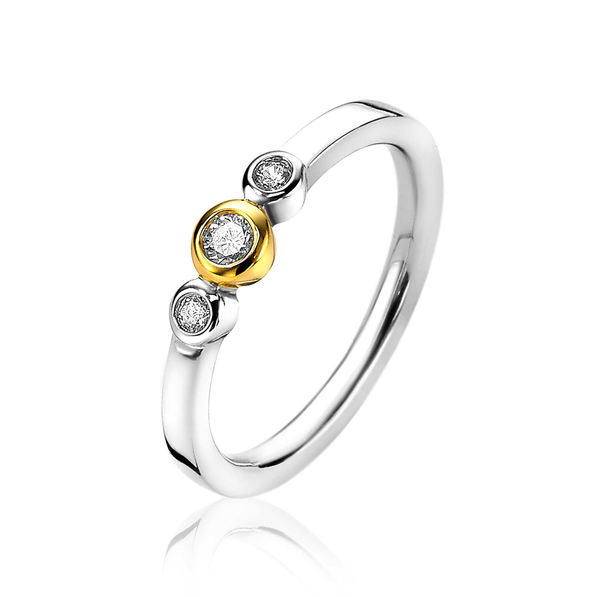 Ring van zilver met een gouden accent en drie heldere steentjes.