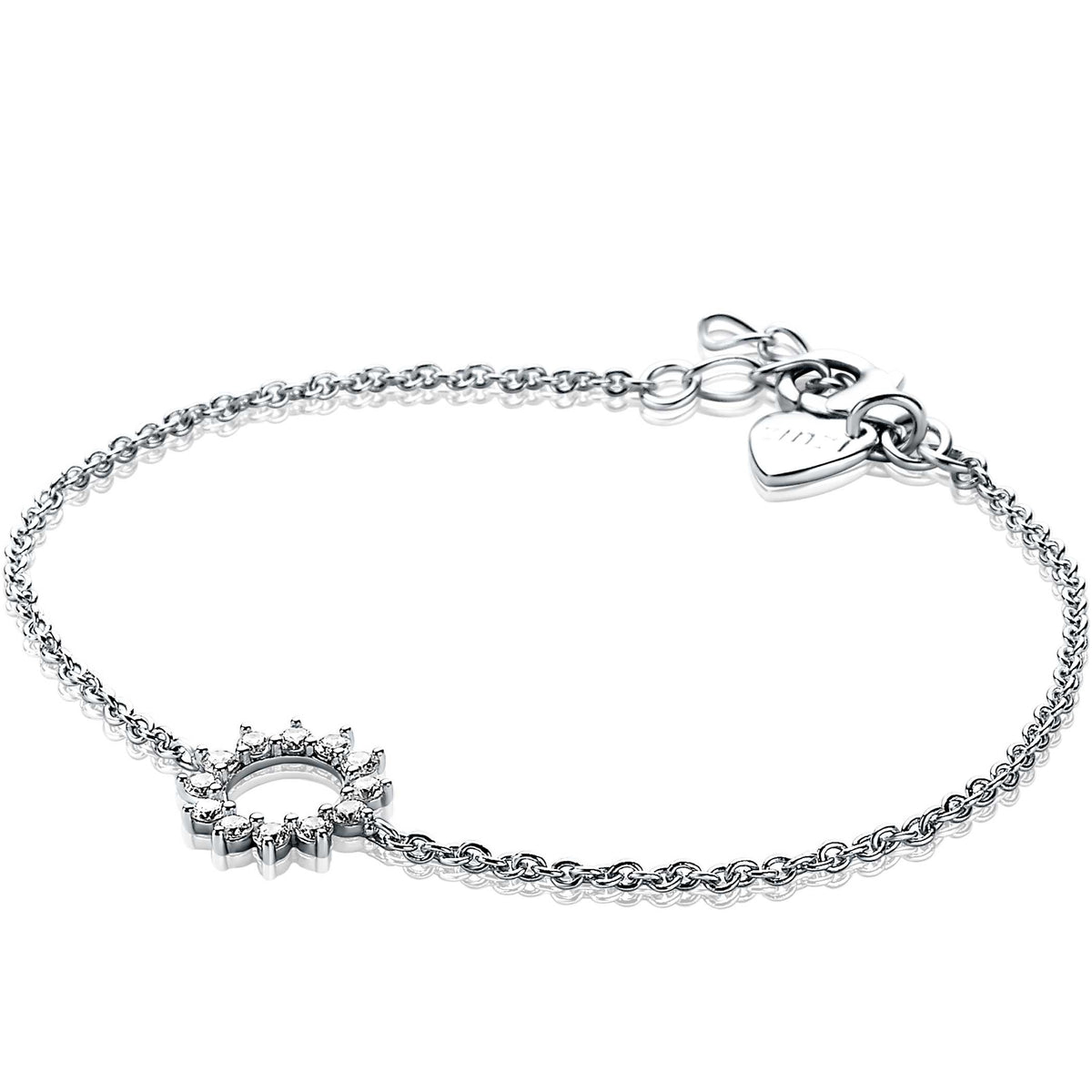 De Zinzi Armband Zilver Zia1883 van Zinzi heeft een delicate zilveren ketting met een bedel in de vorm van een zon, versierd met kleine diamantjes, een hartvormige sluiting en een verstelbare ketting voor de perfecte pasvorm.