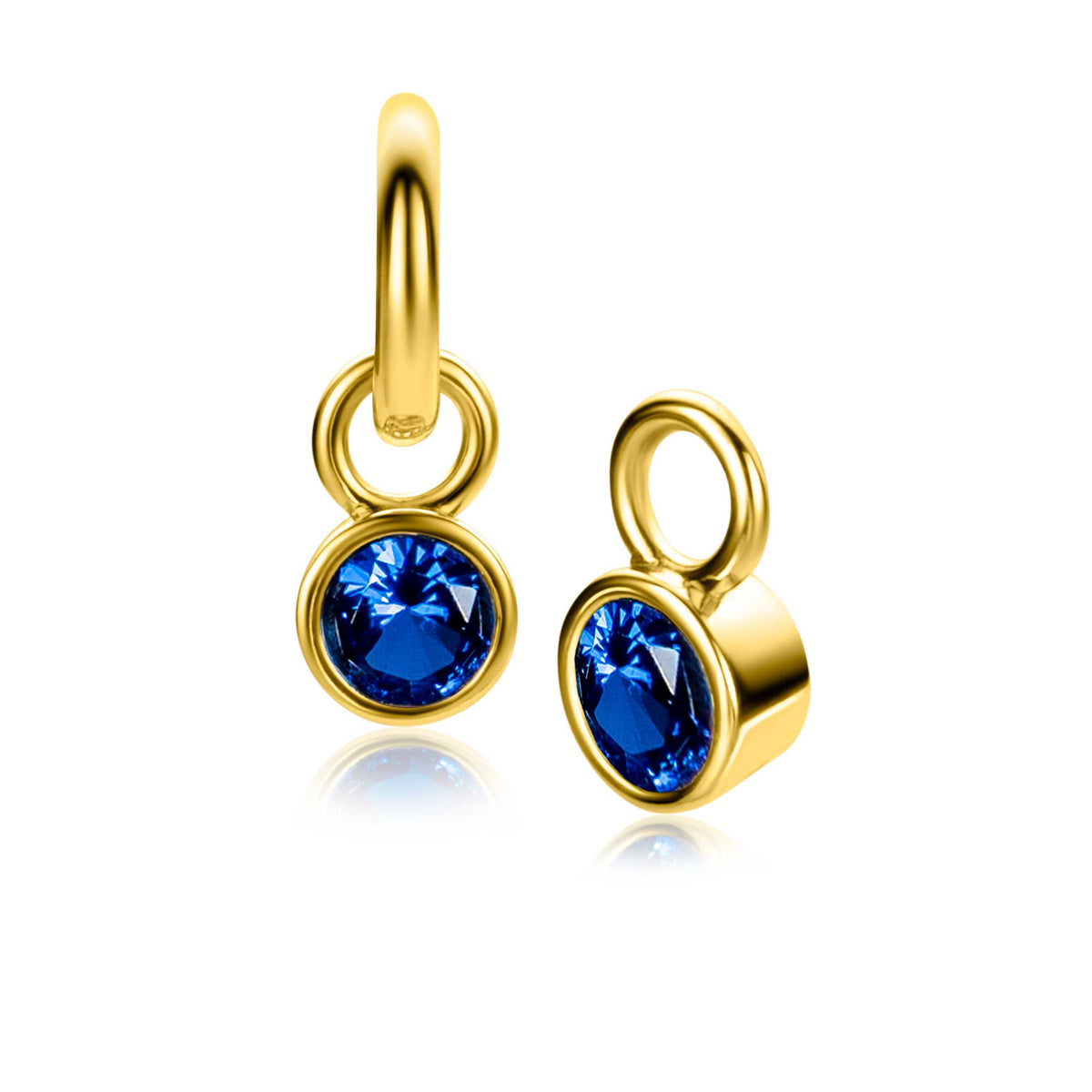 Gouden oorbellen met een blauwe zirkonia, hangend ontwerp en een glanzende afwerking.