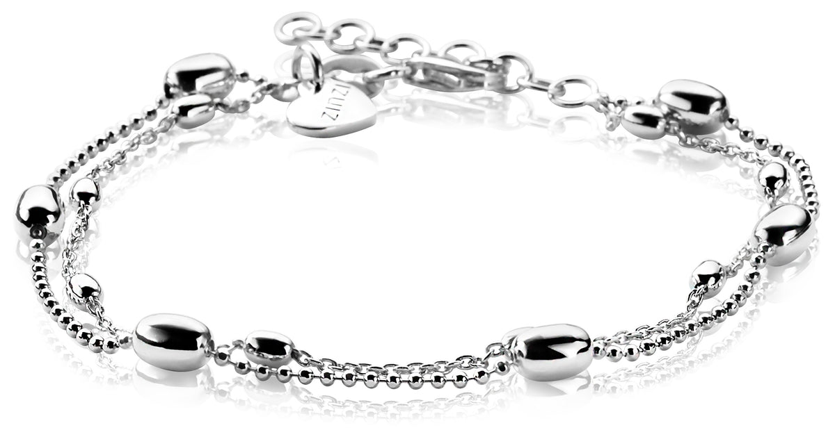 Zilveren armband met een combinatie van bolle en ronde schakels, voorzien van een verlengkettinkje.