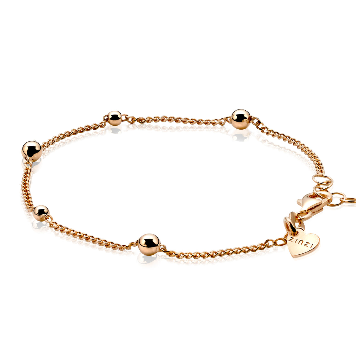 Gouden armband met bolletjes, fijne schakels en een karabijnsluiting.