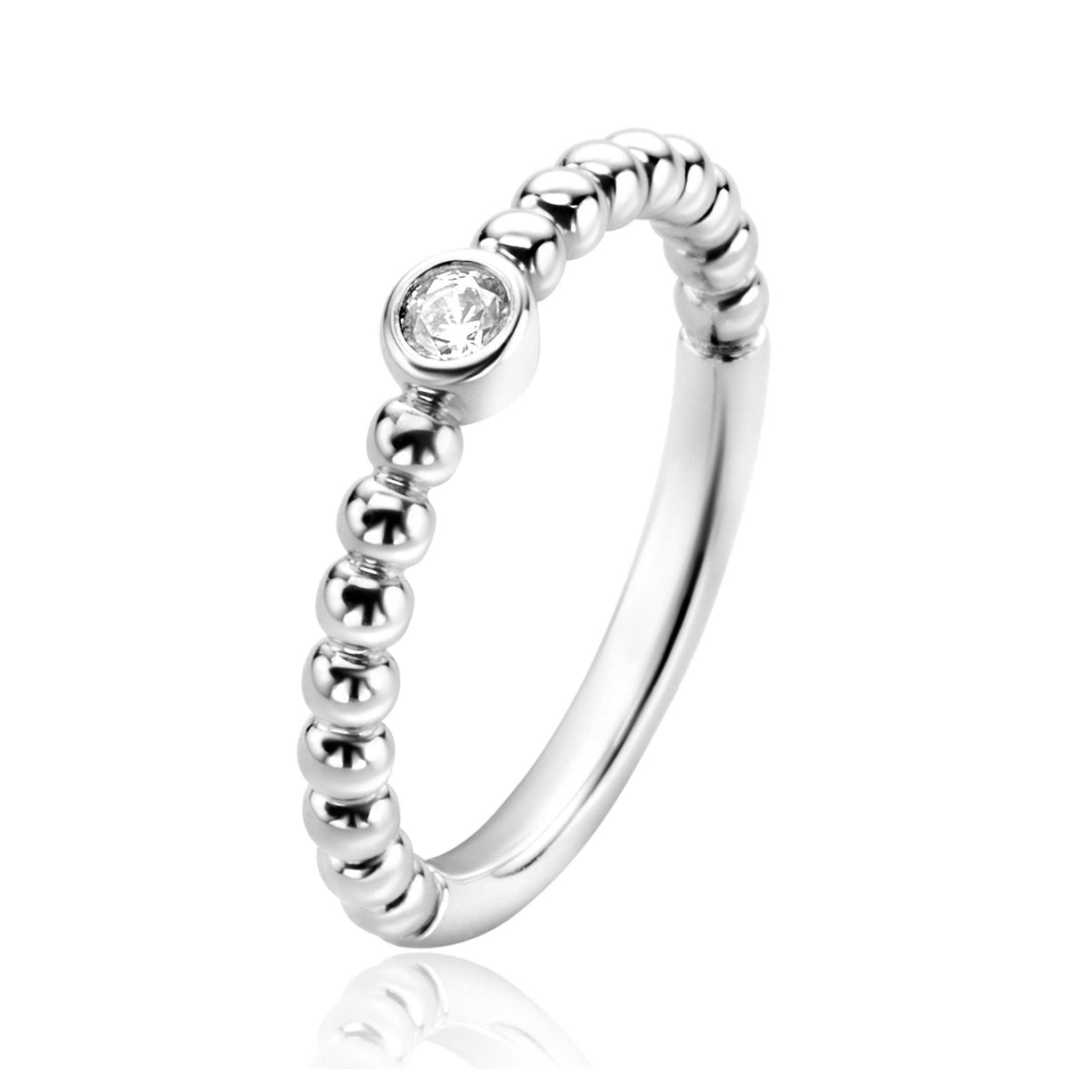 Zilveren ring met bolletjesstructuur en een heldere, ronde zirconia in het midden.