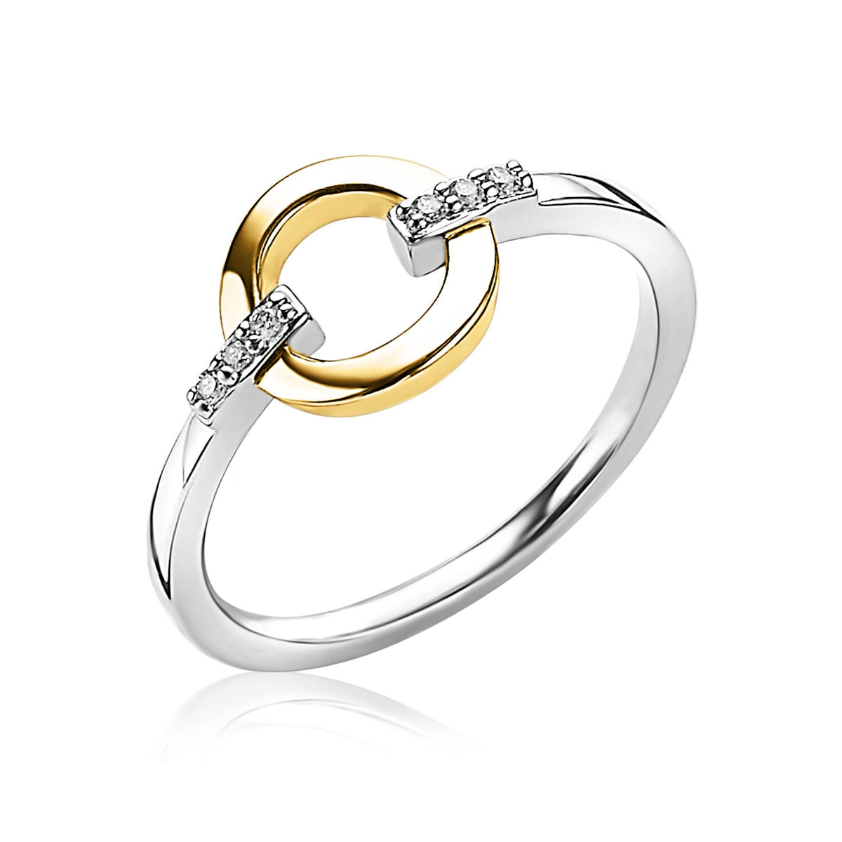 Gouden en zilveren ring met een dubbele cirkel en kleine steentjes aan de zijkanten.