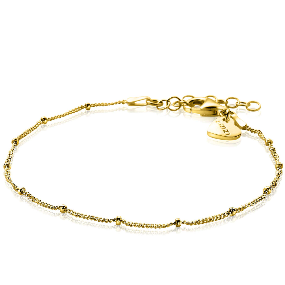 Gouden armband met bolletjes en een verlengkettinkje.