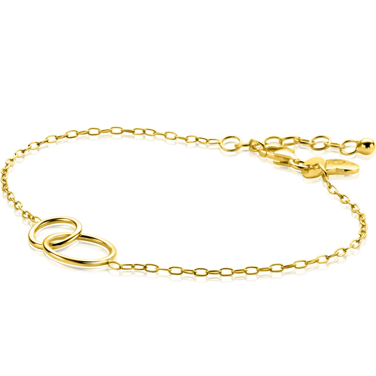 Gouden armband met schakels en twee overlappende ringen als opvallend detail.