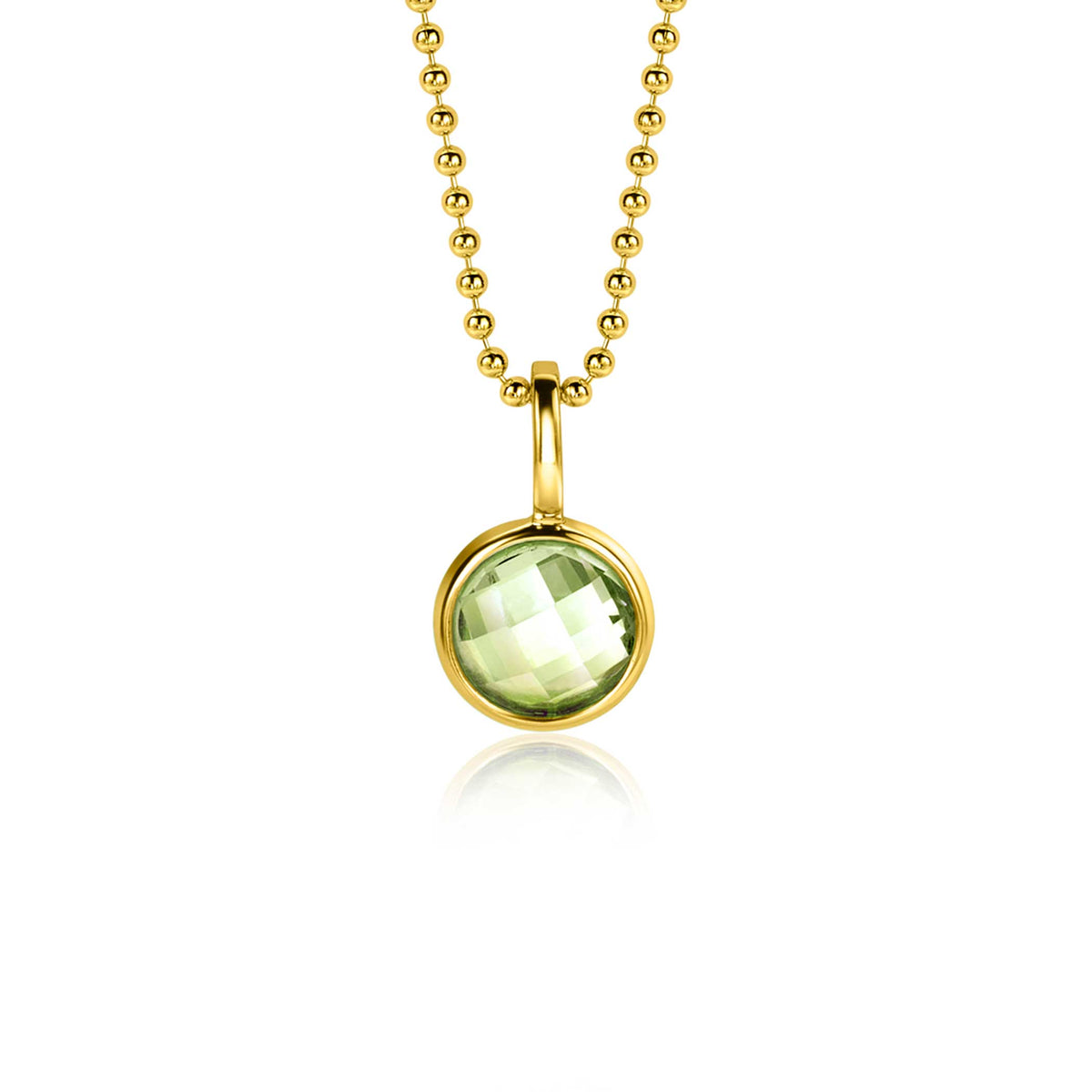 Gouden hanger met een groene, facetterende steen aan een bolletjesketting.