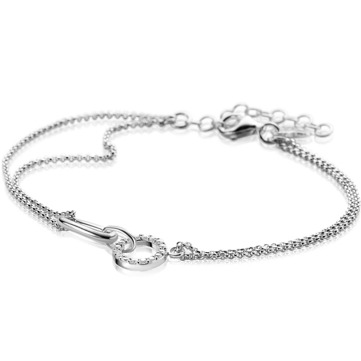 Zilveren armband met een fijn schakelpunt en een opvallende sluiting in de vorm van een sleutel.
