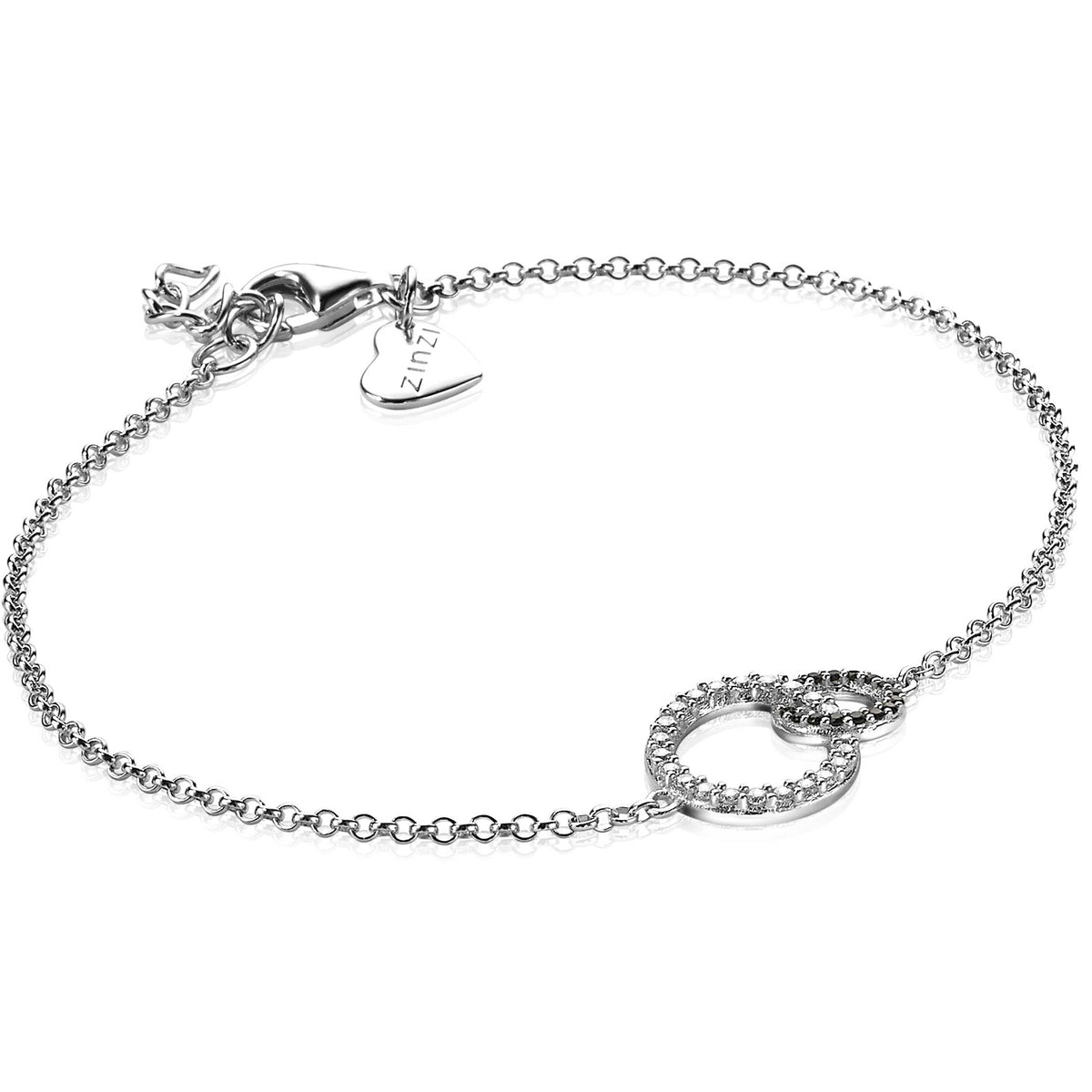 Zilveren armband met twee ringen, een gladde en een met steentjes, op een fijne schakelband.