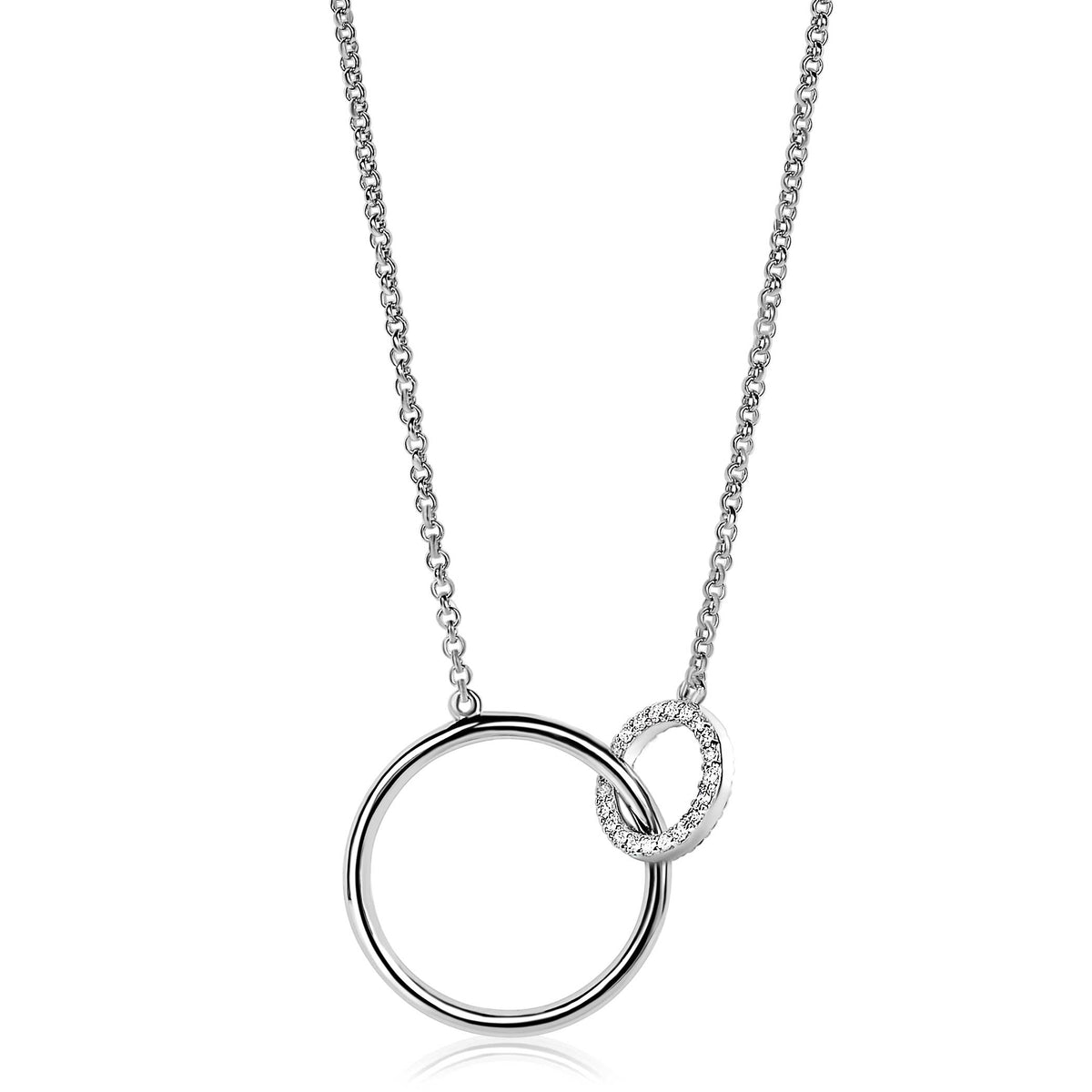 Zilveren ketting met een grote ronde hanger en een kleinere ring bezet met steentjes.