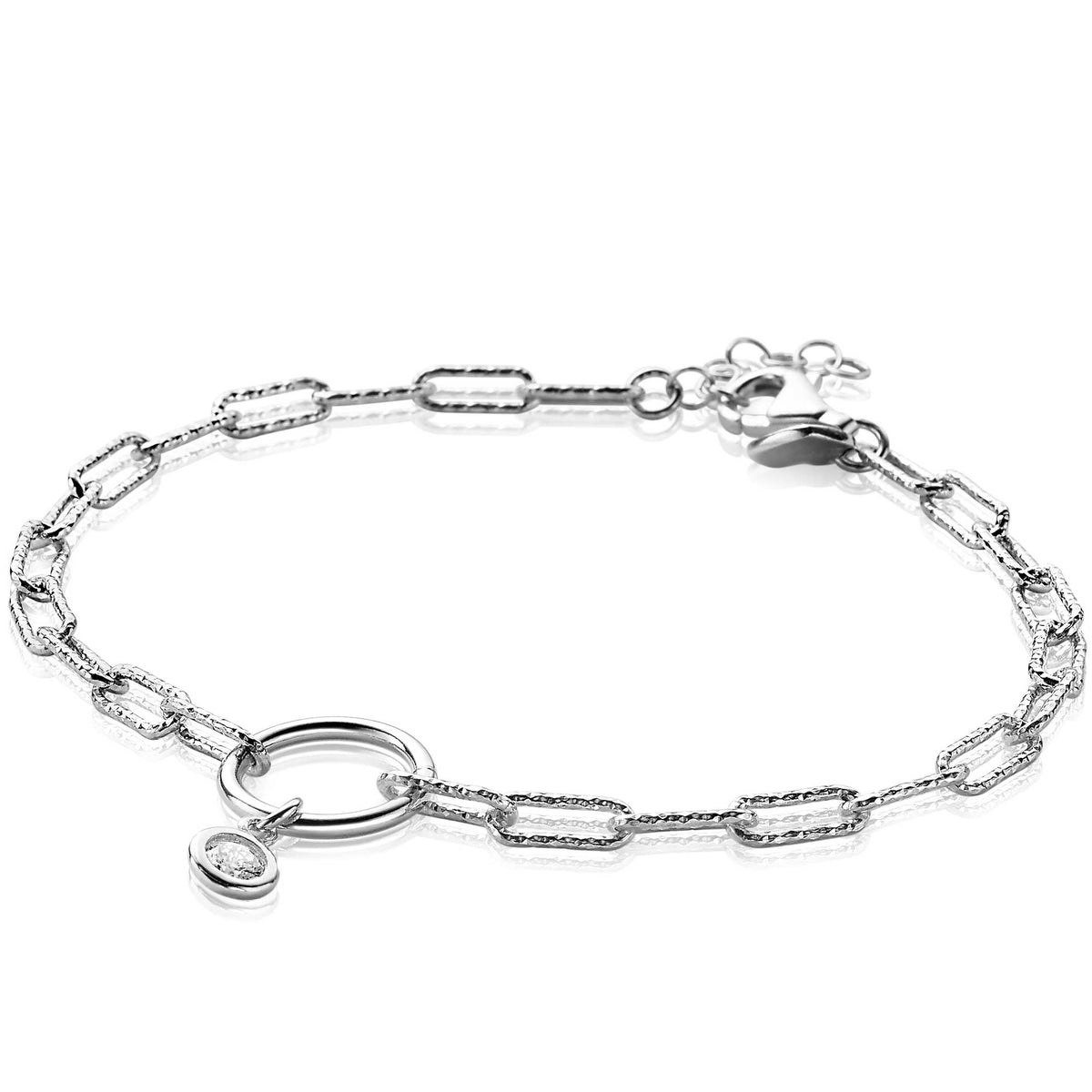 Zilveren armband met schakels en een ronde hanger met een steentje.