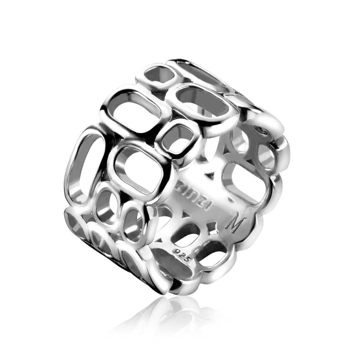 Zilveren ring met opengewerkt ontwerp en ronde vormen.
