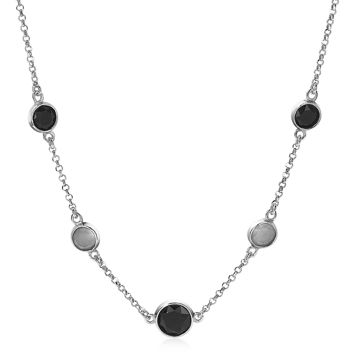 Zilveren ketting met zwarte en zilveren ronde schakels.