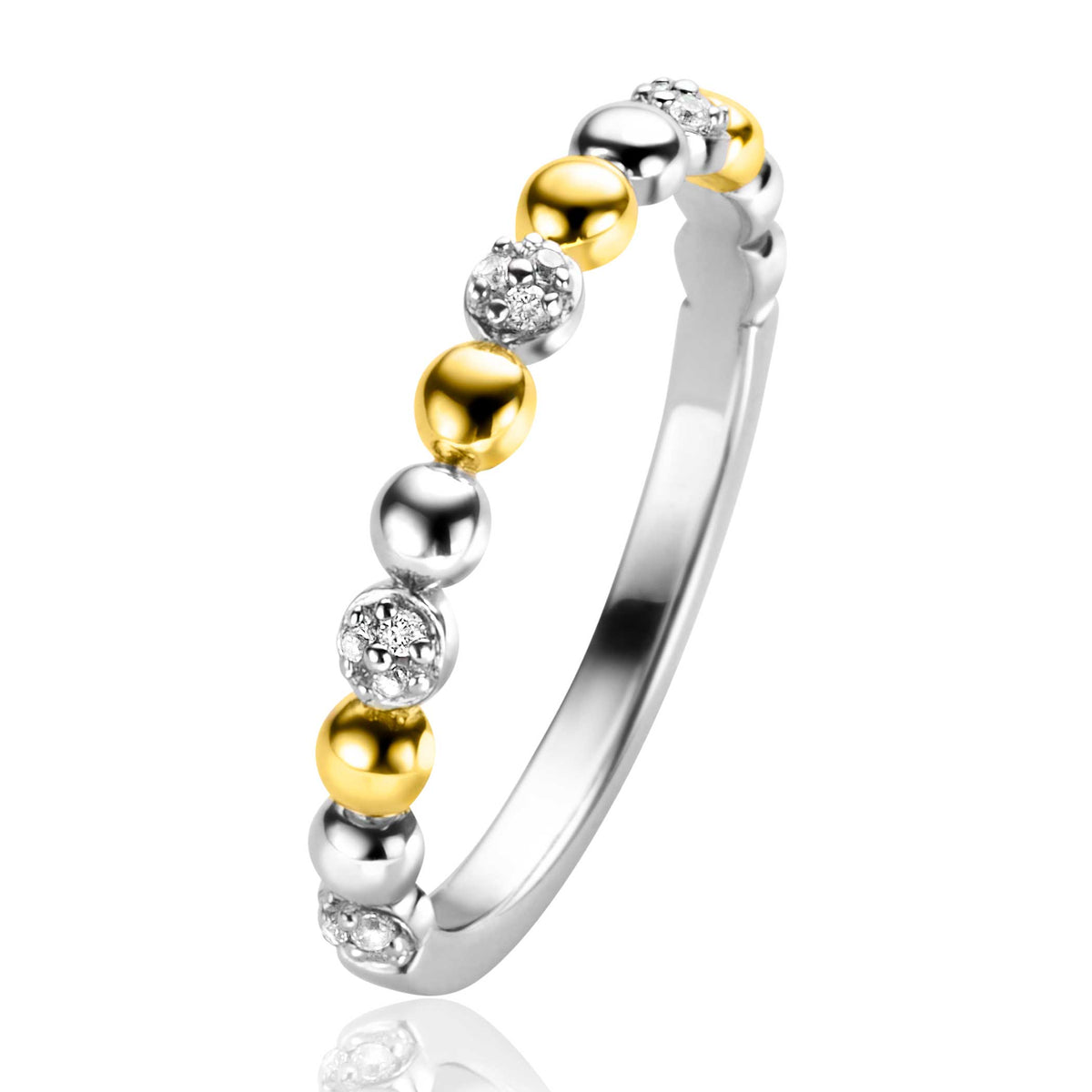 Zilveren ring met gouden en zilveren bolletjes en sprankelende steentjes.