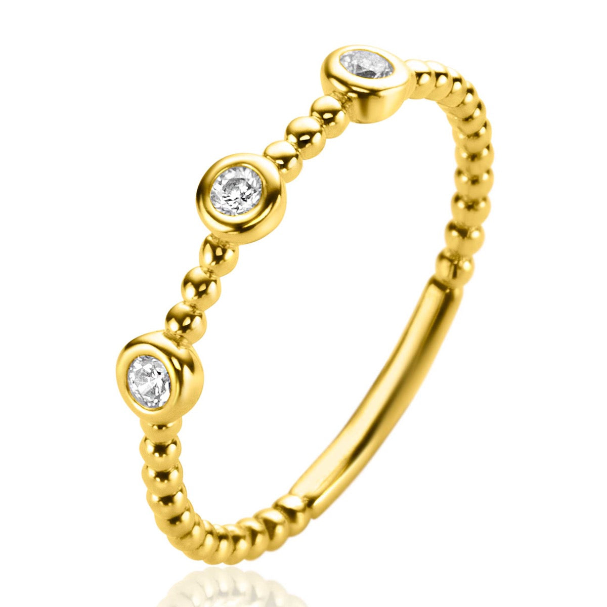Gouden ring met bolletjesdesign en drie kleine, sprankelende steentjes.