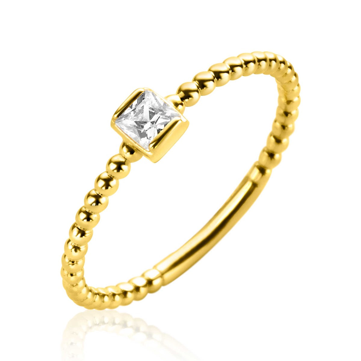 Gouden ring met een bolletjesband en een vierkante, heldere steen in het midden.