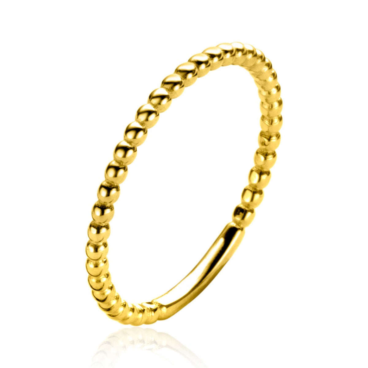 Gouden ring met een bolletjesstructuur en een gladde afwerking.