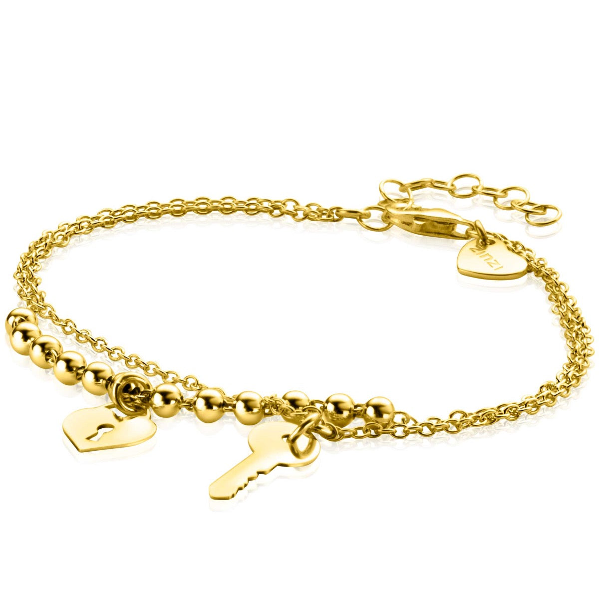 Gouden armband met schakels, bolletjes en hangers in de vorm van een hartje en een sleutel.