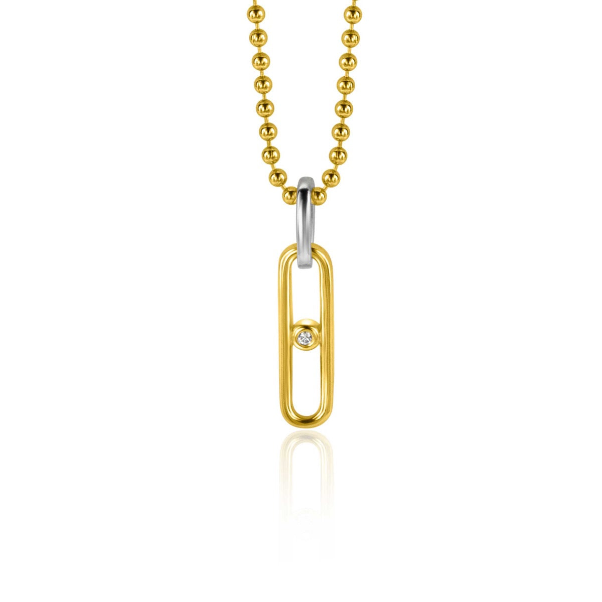 Gouden hanger in de vorm van een paperclip met een kleine steen, aan een bolletjesketting.